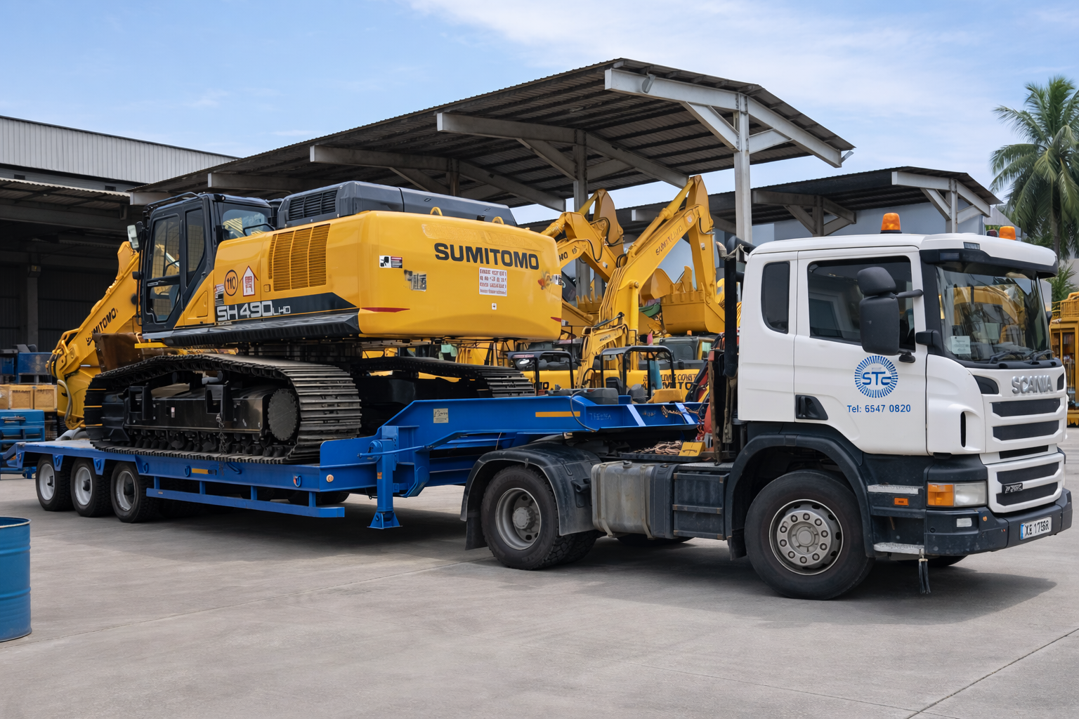 Scania truck and Sumitomo excavator at worksite