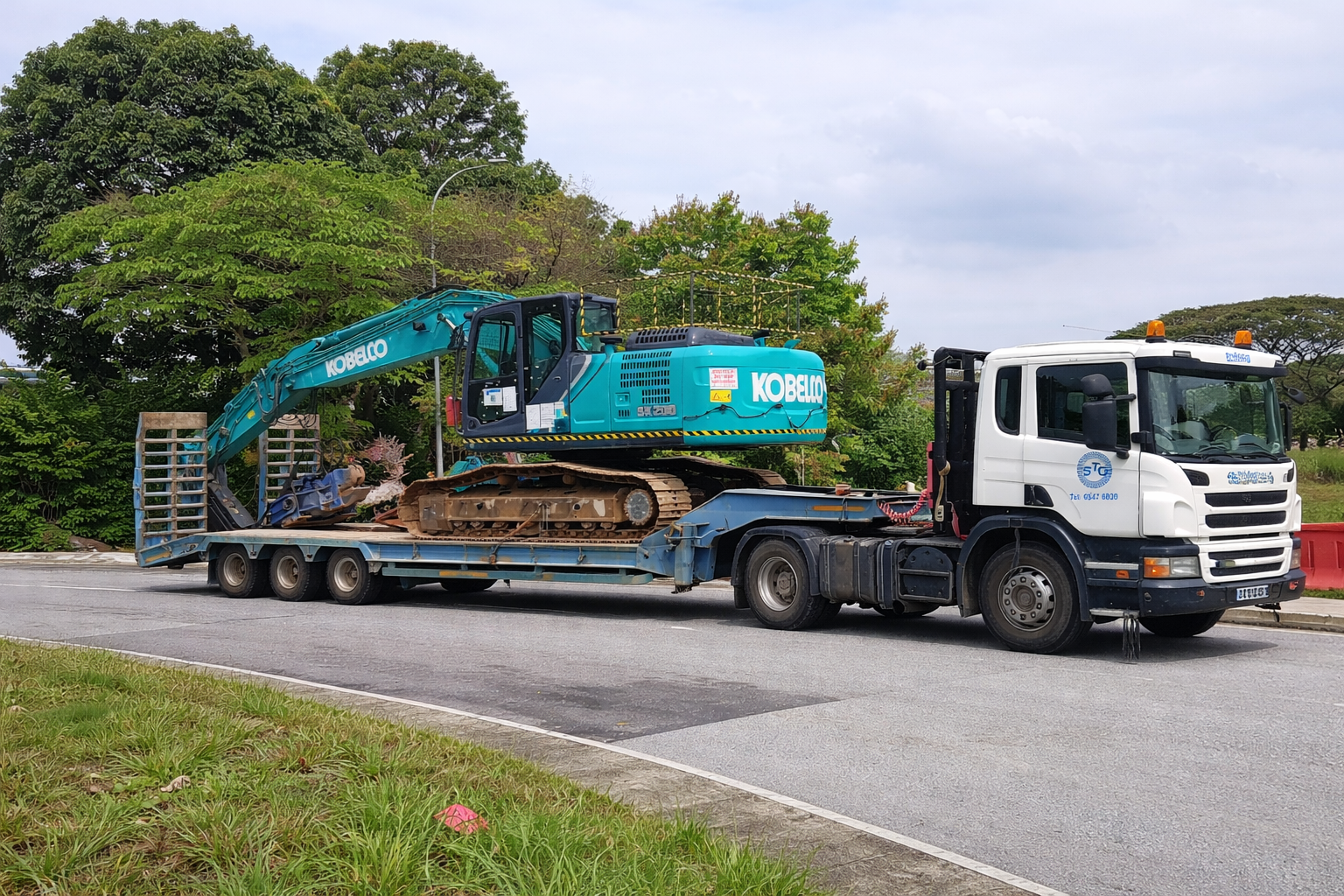 Truck Towing Excavator